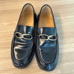 Frame Denim Black Leather Loafers with Gold Chain Accent